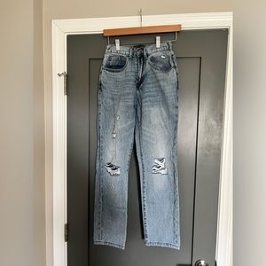 Risen Mid-Rise, Light Wash Distressed Denim